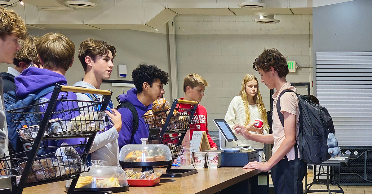 FRCS junior Jake Dreiling serving classmates during lunch